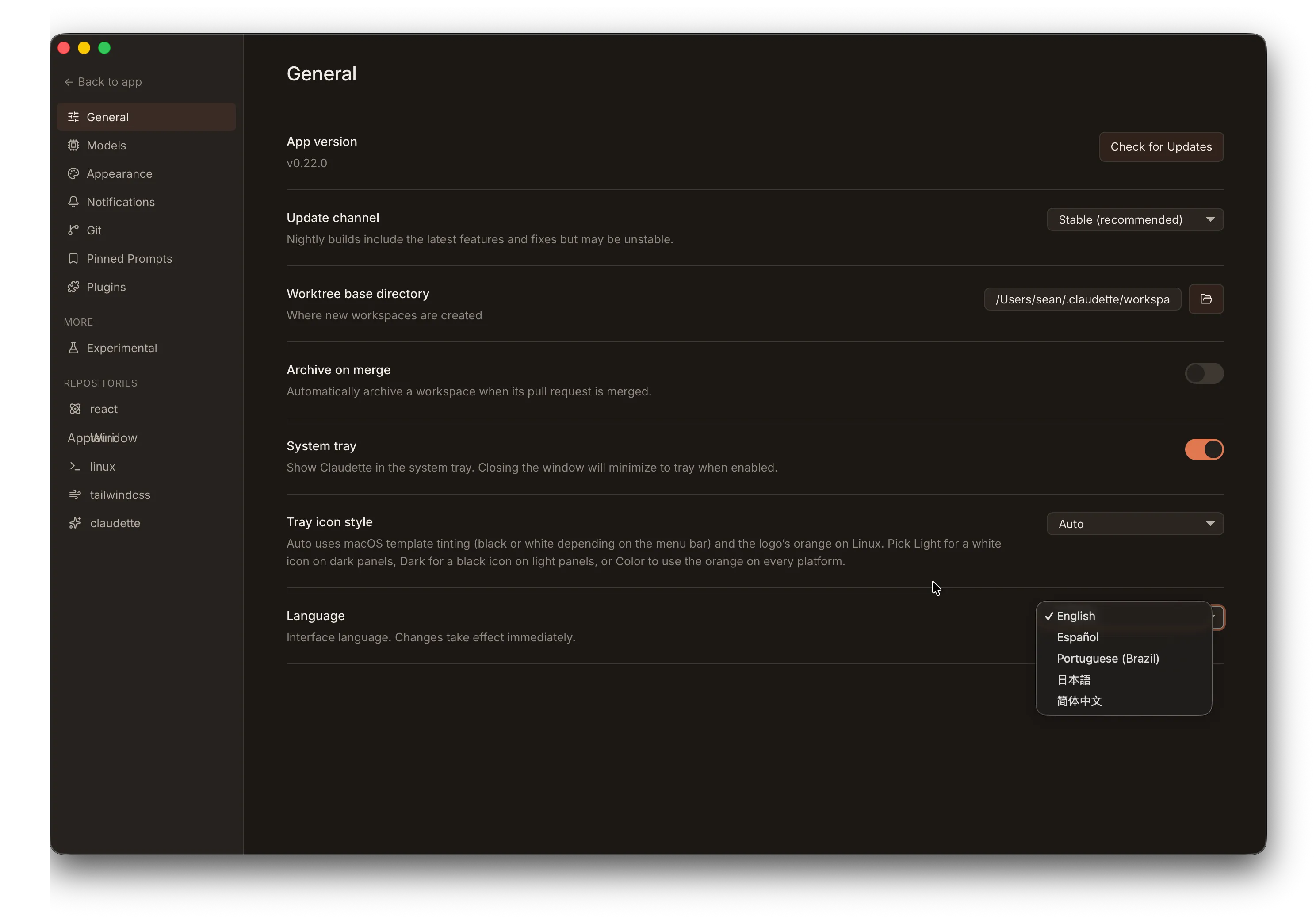 General settings with the Language dropdown open, showing English, Español, Portuguese (Brazil), Japanese, and Simplified Chinese options